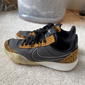 Women’s Nike Black and Leopard Patterned Waffle Racer 2X Sneakers
